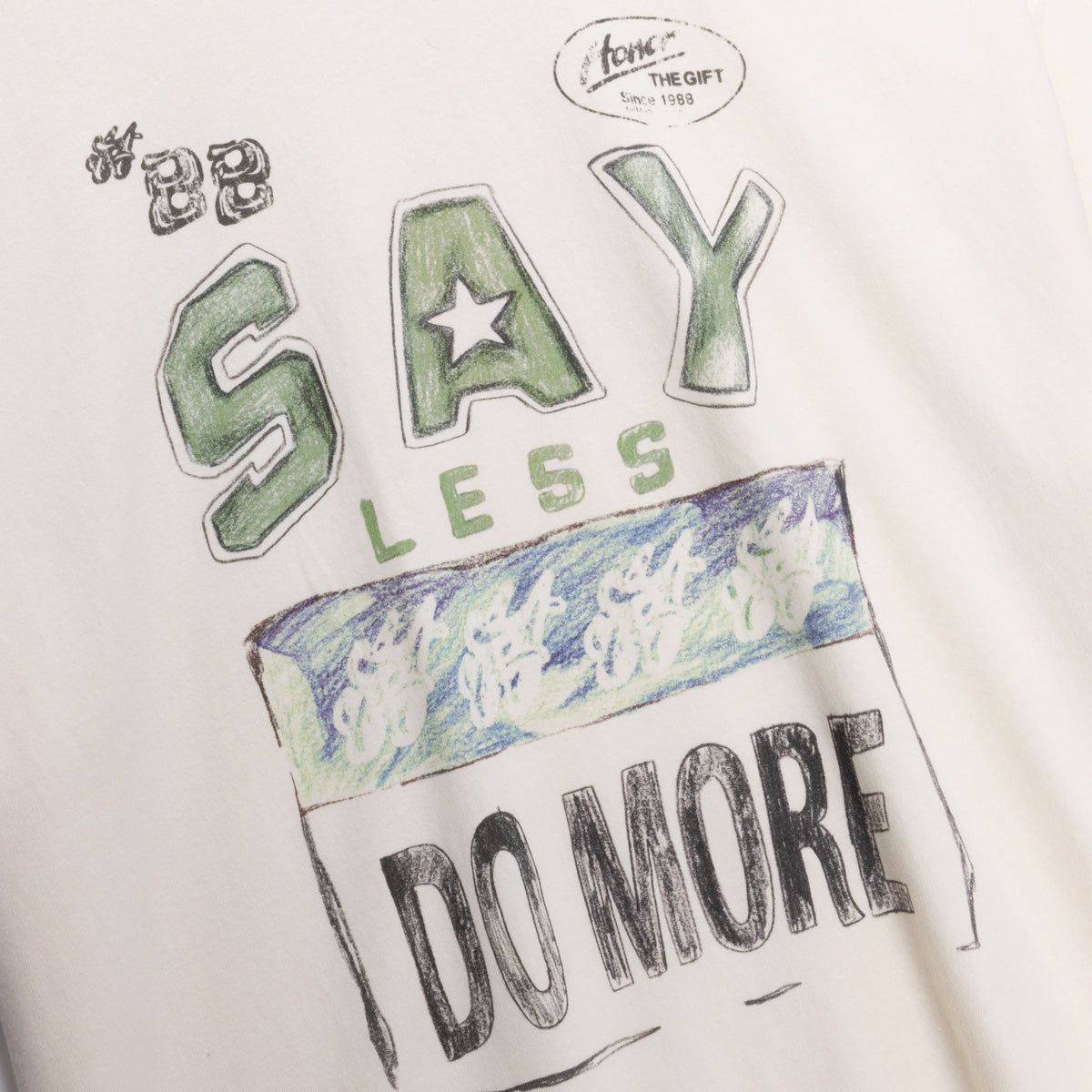 SAY LESS DO MORE TEE HTG